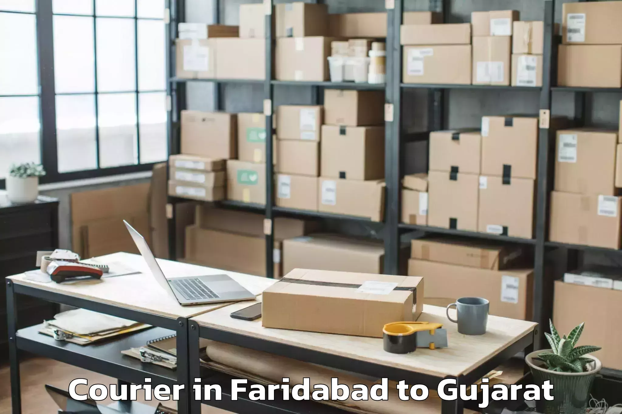 Quality Faridabad to Songadh Courier